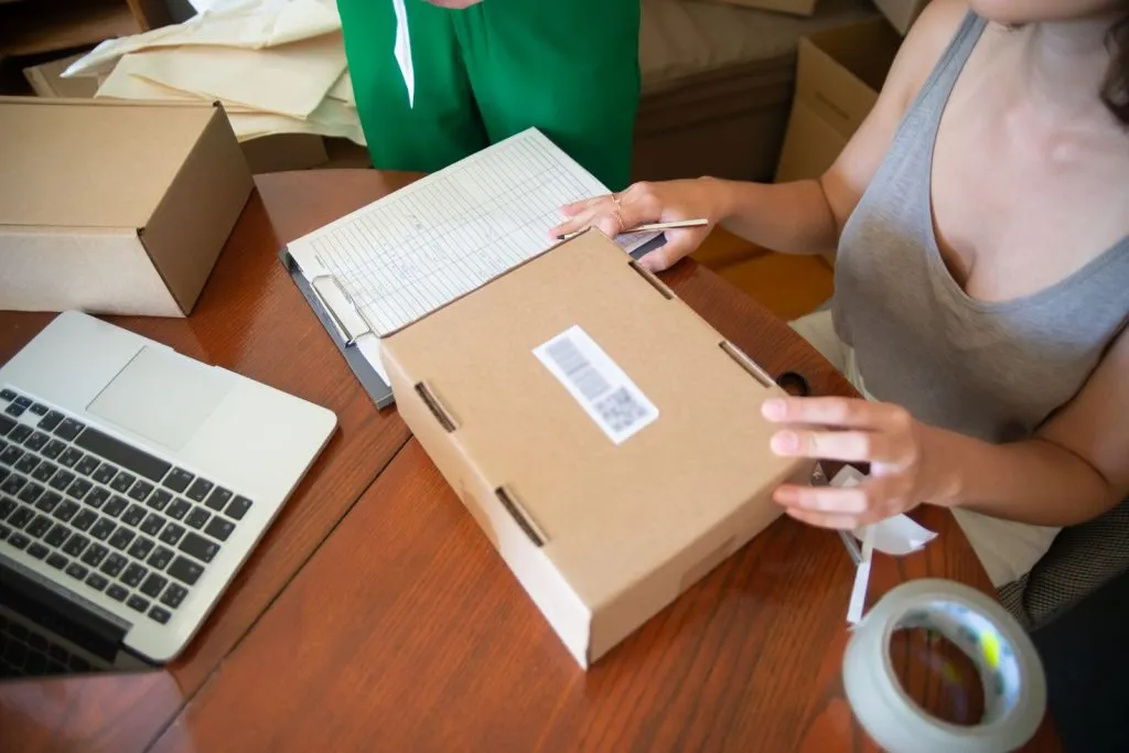 Online store team packing customer orders